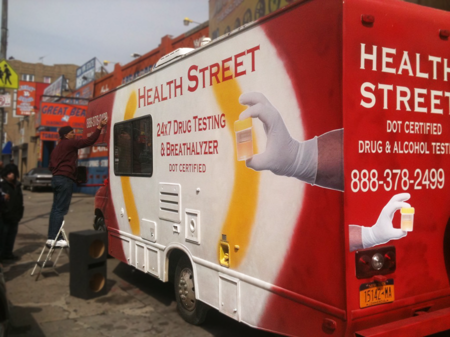 Mobile drug testing and breathalyzer van with Health Street branding parked on a city street, featuring contact information and DOT certification.
