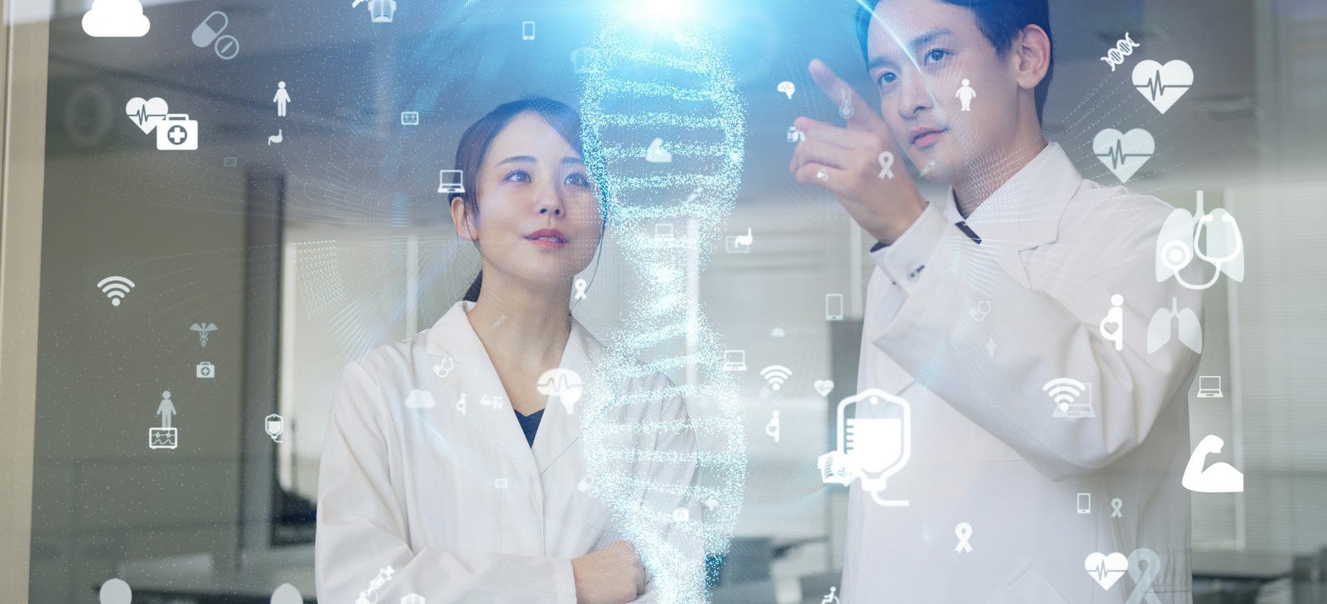 Two scientists in lab coats examining a digital DNA helix with medical icons overlayed.